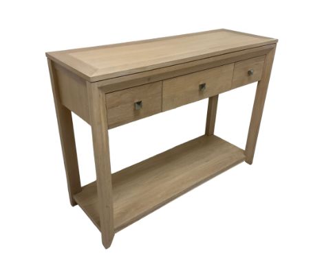 Limed oak console or side table, fitted with three drawers and undertier Dimensions: Height:&nbsp;84cm&nbsp; Length/Width:&nb