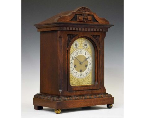Junghans - Early 20th century German oak-cased chiming mantel or bracket clock, the brass dial with silvered Arabic chapter r