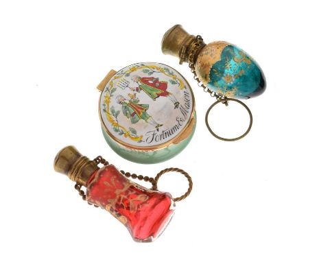 Two Continental glass scent bottles, each with gilt metal tops, together with a boxed Crummles Fortnum &amp; Mason enamel box