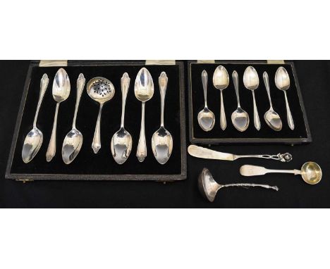 Cased set of six George VI silver fruit spoons and sifting spoon, Birmingham 1945, a cased set of six silver teaspoons, Birmi