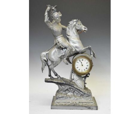 Large metal figural mantel clock of a knight on horseback, having a circular Roman dial, 58cm high