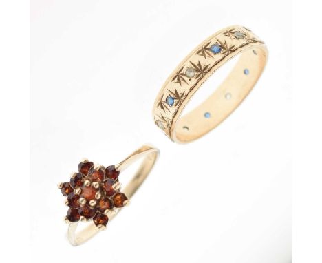 Two 9ct gold stone set rings, one set garnet-coloured stones, size R approx, the other set blue and white stones, size S appr