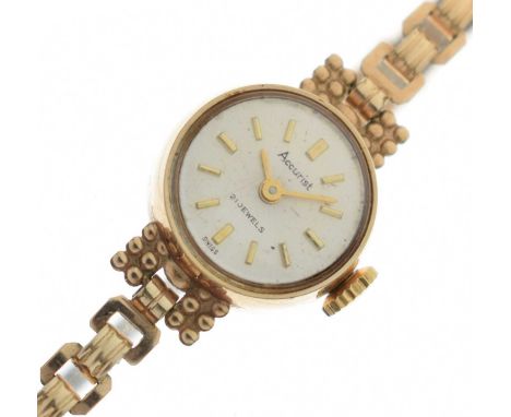 Accurist - Lady's 9ct gold cased cocktail watch, having a silvered dial with applied gilt baton hour markers and gilt hands, 