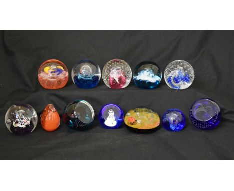 Caithness - Group of twelve glass paperweights including; 'Slipstream', 'Towards The Millennium', 'Mymad', 'Wheel of Fortune'