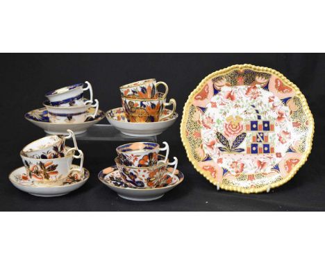 Four 19th century Imari decorated porcelain trios, probably Spode, and a Copeland Spode Imari plate, 23cm diameter and smalle