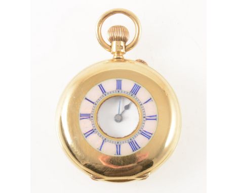 A small 18 carat yellow gold demi hunter pocket watch, the white enamel dial covered by a glass having a Roman numeral chapte