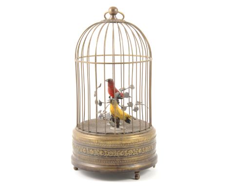 A French style 'Singing Birds' musical automaton, 20th century, brass bird cage design, 27cm.