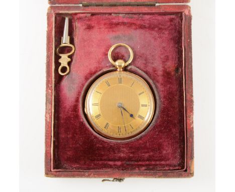 A small 18 carat yellow metal gold open face pocket watch, the gold coloured dial with engine turned decoration to centre hav