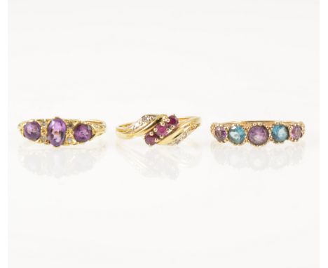 Three gemset dress ring, an 18 carat yellow gold reproduction carved claw mount set with three amethyst and four diamond poin