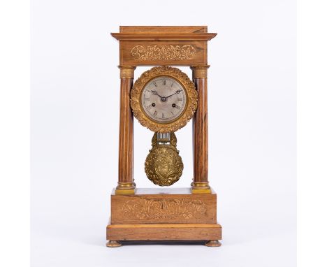 A Napoleon III rosewood and marquetry portico clock, with four Doric columns supporting the pediment and mechanism, silvered 