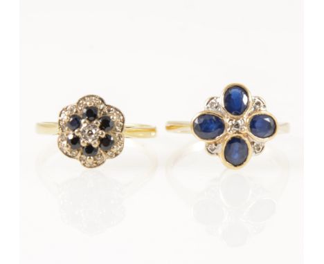 Two sapphire and diamond circular cluster rings. an 18 carat yellow and white cluster of four oval sapphires, rub-over set an