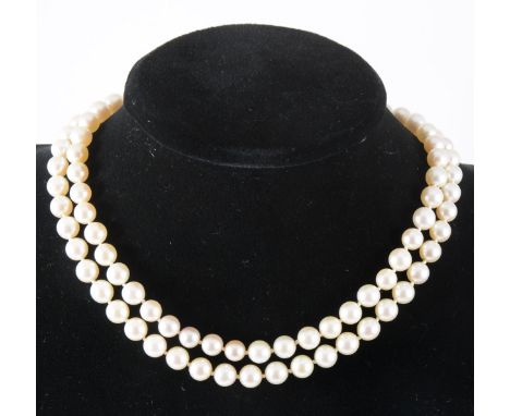 A two row cultured pearl necklace, (45), (49), 8.5mm pearls knotted every pearl into a necklace 45cm long and fitted with a 9