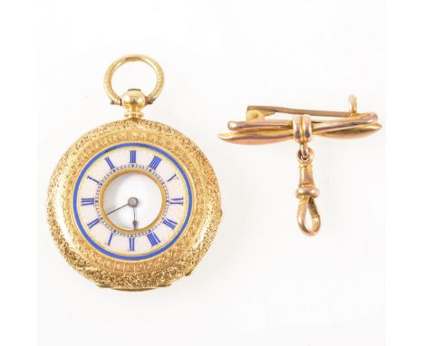 A small yellow metal demi hunter pocket watch with brooch fitting, the white enamel dial not covered by a glass having a Roma