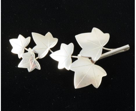 Geoffrey Bellamy for Ivan Tarratt a silver ivy leaf brooch, the six graduated ivy leaves articulated into two sections, 8cm x