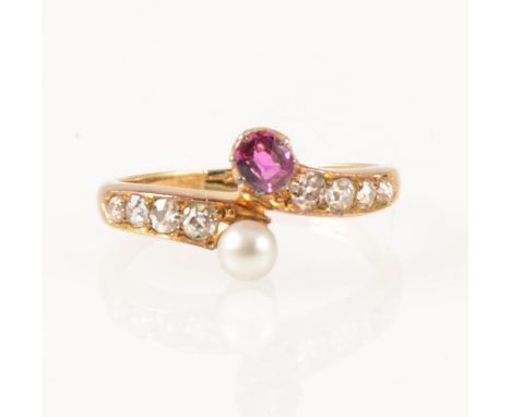 A pearl and diamond crossover ring, a 3.8mm pearl and single pink stone set in an 18 carat yellow gold crossover mount with f