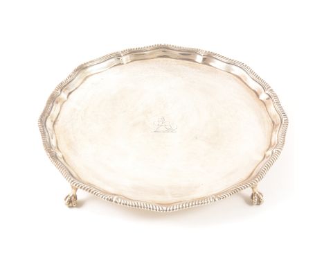 A Victorian silver salver, Thomas Bradbury &amp; Sons, London 1899, moulded and gadrooned outline, engraved crest, raised on 