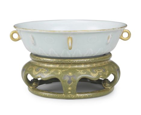 A exceptionally rare Imperial revolving pale-green-glazed bowl on gilt and silver teadust-glazed standQianlong seal mark and 