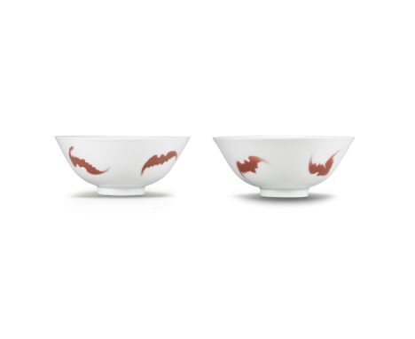 A RARE PAIR OF COPPER-RED-DECORATED 'FIVE BATS' BOWLSYongzheng six-character marks and of the periodEach finely potted with d