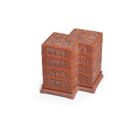 A RARE CINNABAR LACQUER CARVED THREE-TIERED DOUBLE-LOZENGE-SHAPED BOX, COVER AND STANDQianlong The cover meticulously carved 