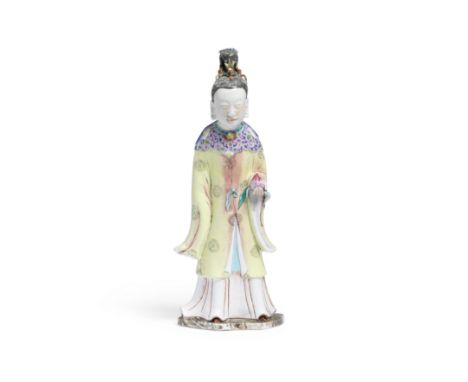 A famille rose figure of a female immortal18th century Finely modelled standing, dressed in layered robes with long sleeves p