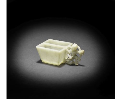 A PALE GREEN JADE 'NORTH STAR' BRUSH WASHER16th/17th centuryOf tapering square form, carved in openwork relief to one side wi