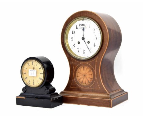 French mahogany and inlaid two train balloon mantel clock striking on a gong, the 5" white dial within a shaped case inlaid w
