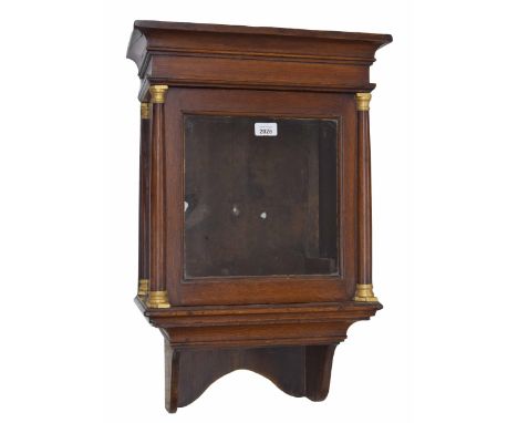Oak hooded wall clock case with aperture for a 10.5" square dial, with sliding pillared hood surmounted by a moulded flat cor