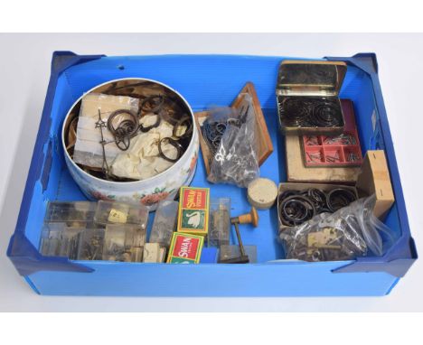 Selection of various old clock fittings including; platform escapements, clock hands and keys, springs, movement parts etc 