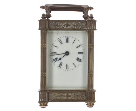 Carriage clock timepiece,&nbsp;within an ornate fluted pillared case decorated with foliate bands, 6.25" high (key) 