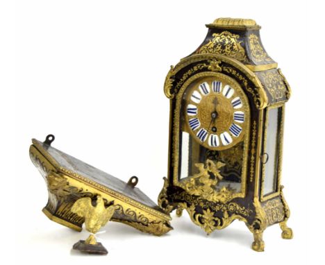 French boule mantel clock timepiece with later Mougin movement, the 5.5" foliate repoussé dial with roman cartouche enamel nu