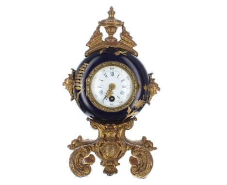 Small French gilt metal and cobalt blue pottery mantel clock timepiece with platform escapement, the 2.25" dial inset into a 