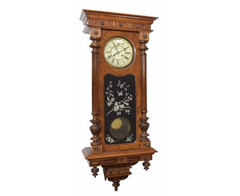 Good walnut two train Vienna regulator wall clock, the 7" cream chapter ring enclosing a recessed plain centre, over a shaped