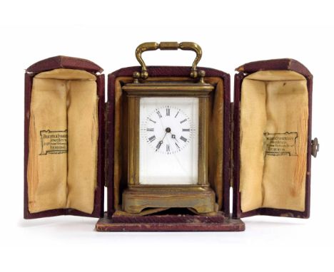 French miniature carriage clock timepiece, stamped H.A. Brevet S.G.D. beneath the base, within a corniche brass case, 4" high