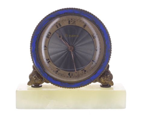 Miniature brass Swiss eight day clock timepiece, the 1.5" gilt chapter ring enclosing an engine turned centre with blue ename