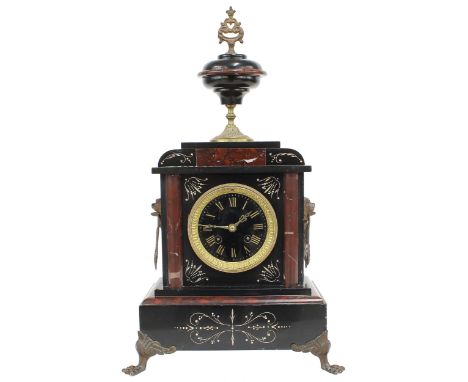 French&nbsp;black slate and red marble ornate&nbsp;two train mantel clock striking on a bell, the 3.5" black slate dial withi