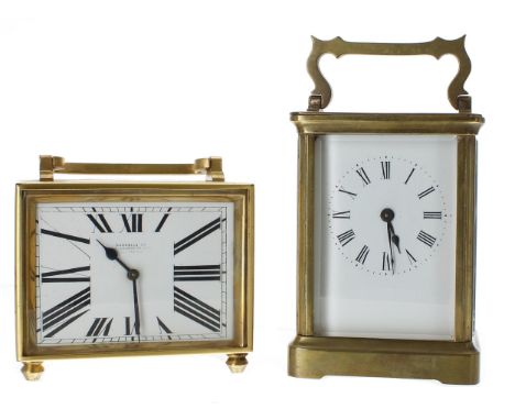 Carriage clock timepiece within a corniche brass case, 5.75" high; also another French carriage clock timepiece, the dial ins