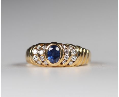 Ring in gold (18k) brilliant cut diamonds (0.22 ct), fine sapphire (0.66 ct)Sizes: D= ±17mmWeight (K): 0.004kgState: at first