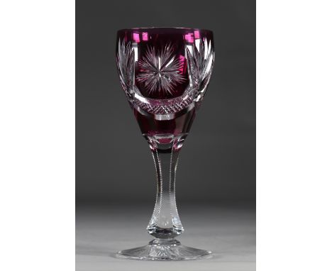 Val Saint Lambert large glass on a finely cut stem on a mauve backgroundSizes: H=275mm D=120mmWeight (K): 1.240kgState: at fi