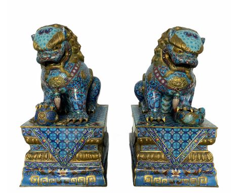 EXCEPTIONAL PAIR OF LARGE CHINESE BUDDHIST LIONS IN GOLD BRONZE AND CLOISONNE ENAMEL CIRCA 1900Region: CHINASizes: H=800mm L=