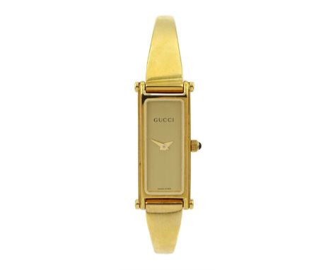 Gucci gold-plated ladies quartz wristwatch, Ref. 1500L, boxed with purchase card dated 2000Condition Report:Movement function