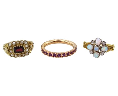 Three silver-gilt stone set rings including garnet and pearl and opal and cubic zirconiaCondition Report:Sizes P-Q, M-N and N