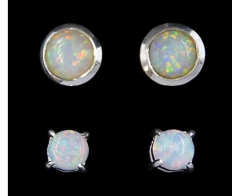 Two pairs of silver opal stud earrings