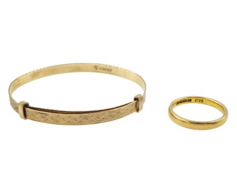 22ct gold wedding band, Birmingham 1932 and a 9ct gold child's bangle, both hallmarkedCondition Report:22ct approx 2.95gm, si