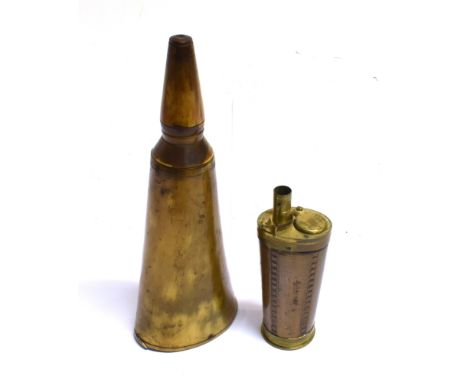 A HORN POWDER FLASK  of tapering outline and a copper oval flask with brass mounts (2), the horn flask length 21cm (2)