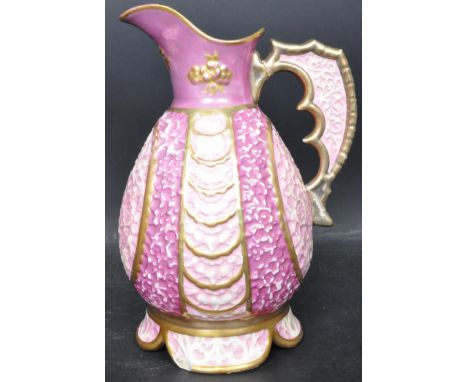 An early 20th Century circa 1900's porcelain Hungarian Zsolnay pecs unusual lustre glazed jug. The vase having gilt decoratio