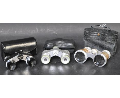 An assortment of three pairs of early 20th century and later binoculars to include a pair of mother of pearl binoculars circa