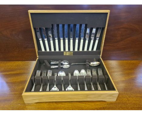 An oak cased canteen of Garrard &amp; Co. EPNS cutlery.