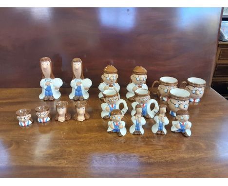 Collection of 17 Tetley tea porcelain mugs, jugs, egg cups, money boxes and condiments made by Wade.