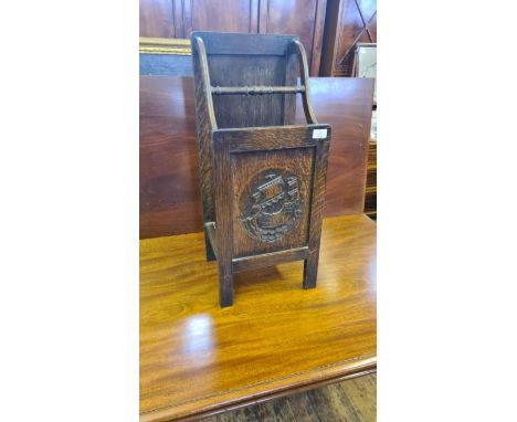 1930's oak stick stand with galleon carved panel.