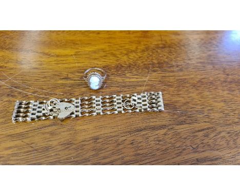 9ct gold padlock and gate bracelet, 12g together with a 9ct cameo ring.